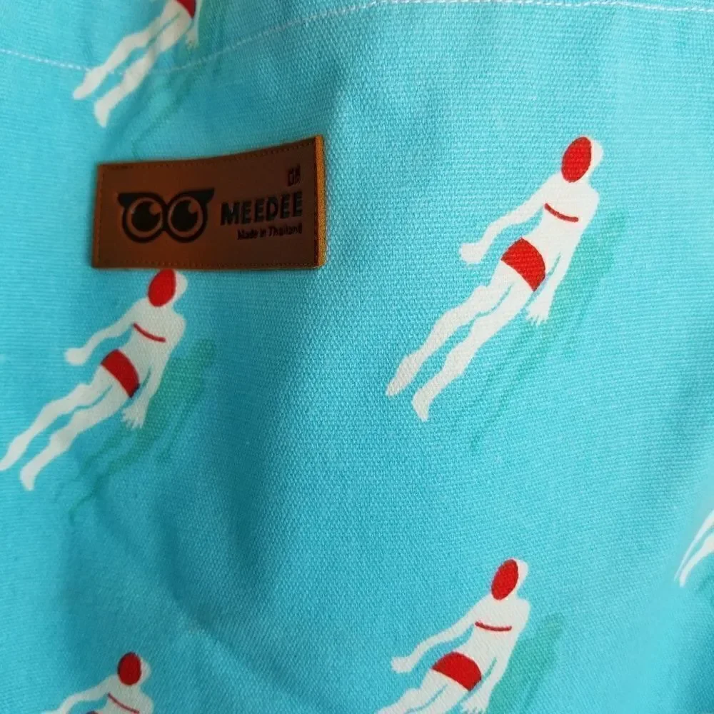 Blue tote bag with vintage swimmer print